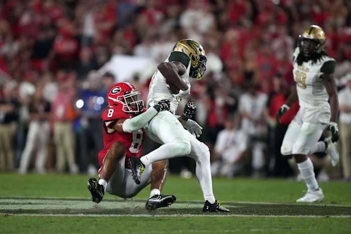 Sep 23, 2023; Athens, Georgia, USA; Georgia Bulldogs defensive back Joenel Aguero (8) tackles UAB Blazers receiver Amere Thomas (17) in the second half at Sanford Stadium.